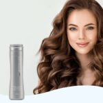 SATINIQUE Hairfall Control Shampoo bottle designed to help reduce hair fall due to breakage, strengthen hair strands, and promote healthier-looking hair.