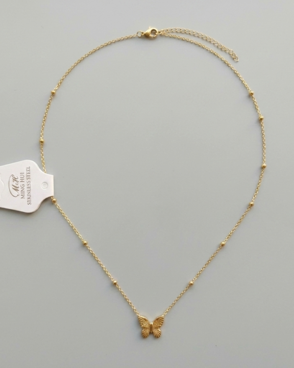 Introducing our Elegant Gold Butterfly Pendant Chain Necklace, a stunning piece crafted from high-quality stainless steel. This minimalist jewelry design beautifully combines elegance and simplicity, making it the perfect accessory for any occasion. The delicate butterfly pendant symbolizes transformation and beauty, while the gold finish adds a touch of luxury. Whether you're dressing up for a special event or adding a chic touch to your everyday outfit, this necklace is versatile enough to complement any style. With its durable construction, this necklace is not only stylish but also built to last. Treat yourself or gift it to someone special to celebrate their unique journey. Embrace elegance with our Elegant Gold Butterfly Pendant Chain Necklace today!